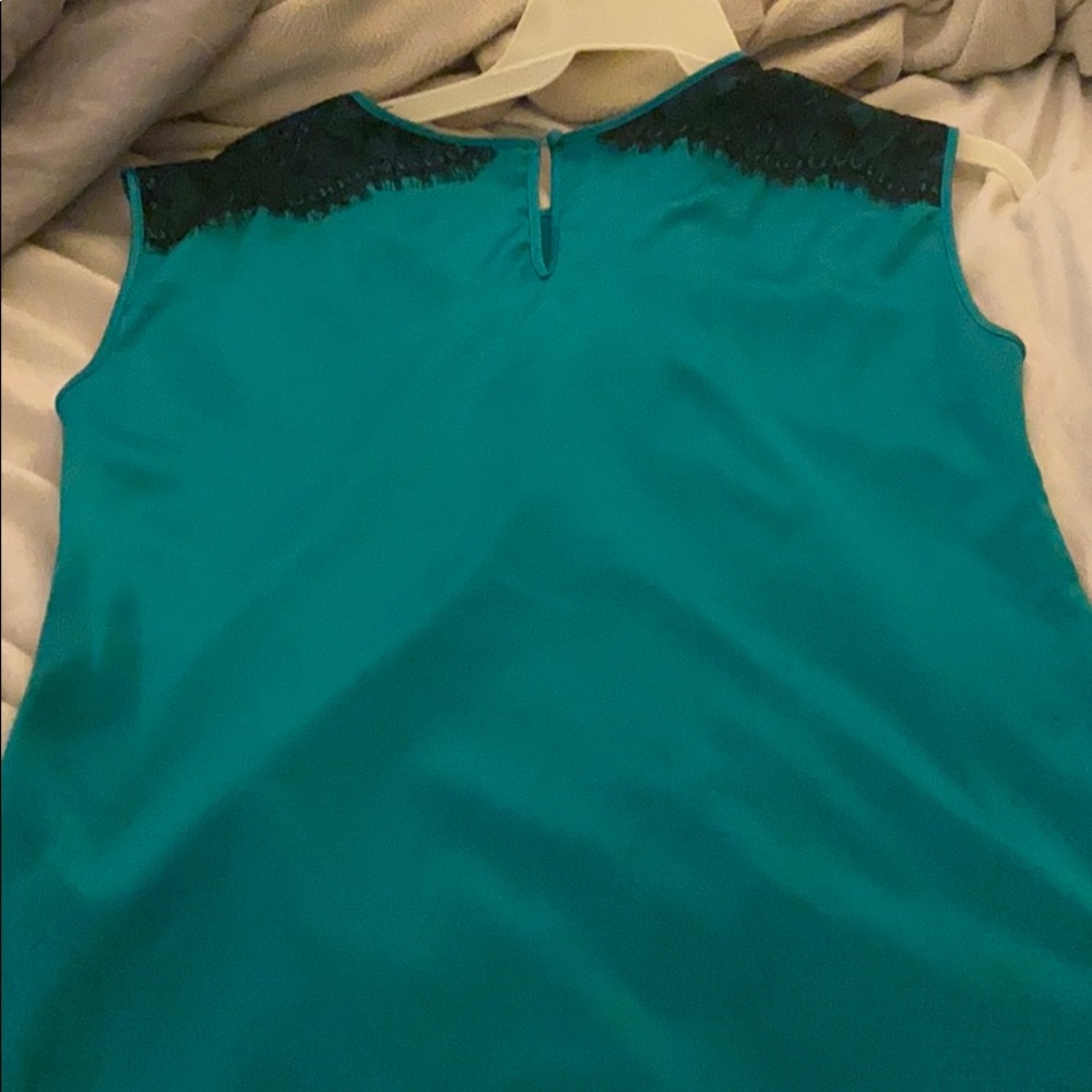 Teal dress shirt with lace on shoulders